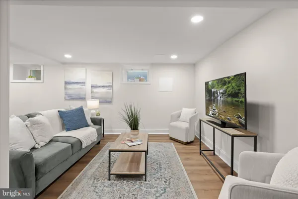 a living room with furniture and a couch