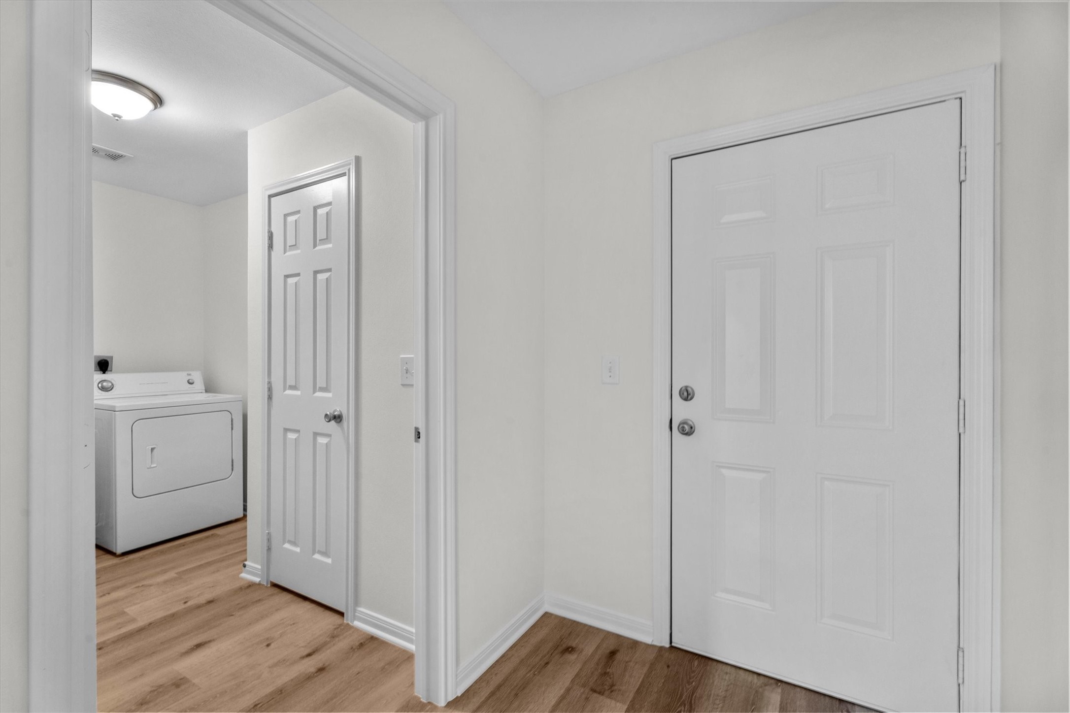 2331 Rue De Lafitte Street San Leon, TX 77539 - Photo 19 of 24 Entry into laundry and exit out to Backyard