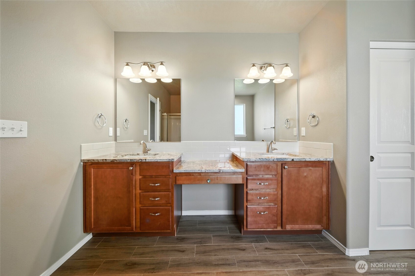110 Shane Porter Road Walla Walla, WA 99362 - Photo 24 of 40 a bathroom with a double vanity sink and a mirror