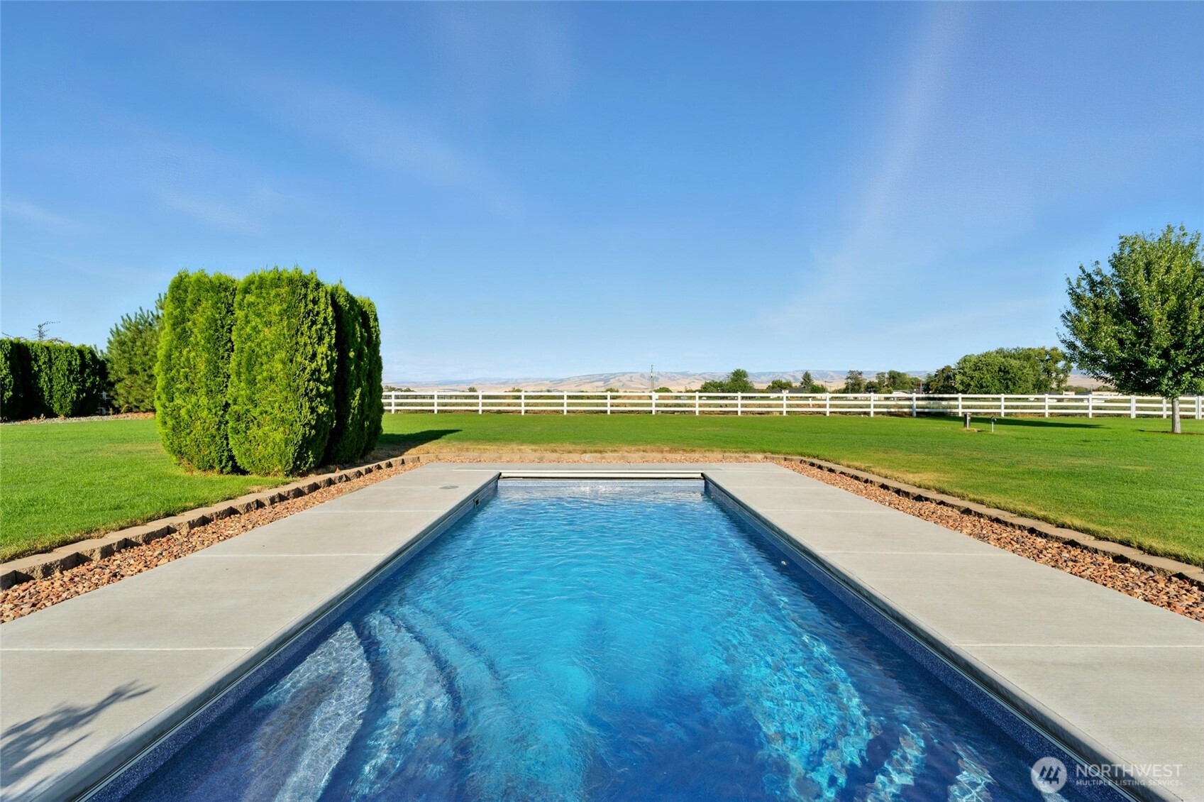 110 Shane Porter Road Walla Walla, WA 99362 - Photo 31 of 40 a view of swimming pool with a yard