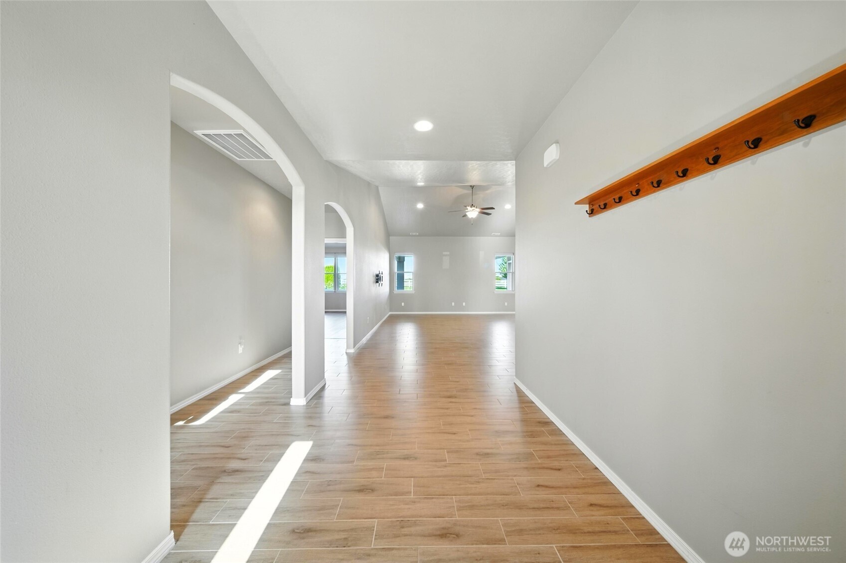 110 Shane Porter Road Walla Walla, WA 99362 - Photo 4 of 40 a view of a hallway with wooden floor