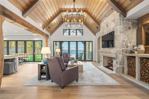 a spacious bathroom with a granite countertop sink toilet and shower