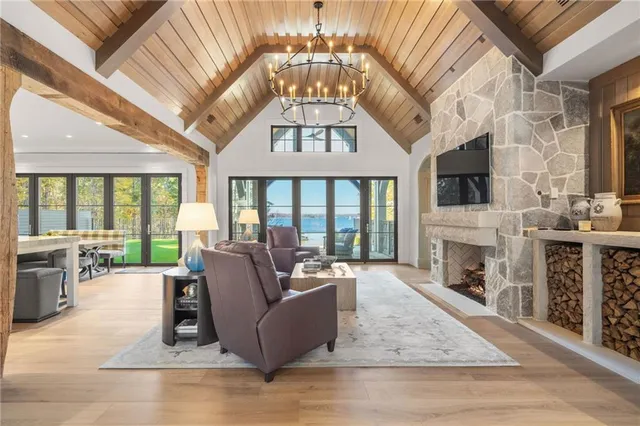 a spacious bathroom with a granite countertop sink toilet and shower