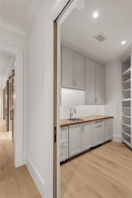 6091 GC Crow Road Flowery Branch, GA 30542 - Photo 21 of 100 a kitchen with granite countertop white cabinets and sink