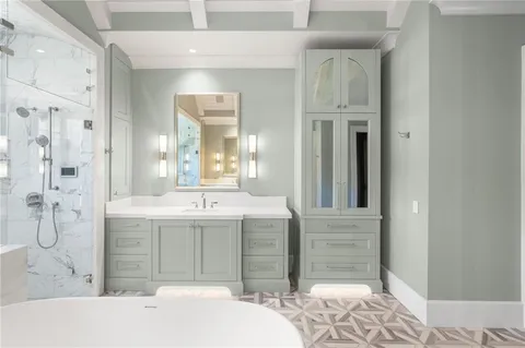 a utility room with sink dryer and washer