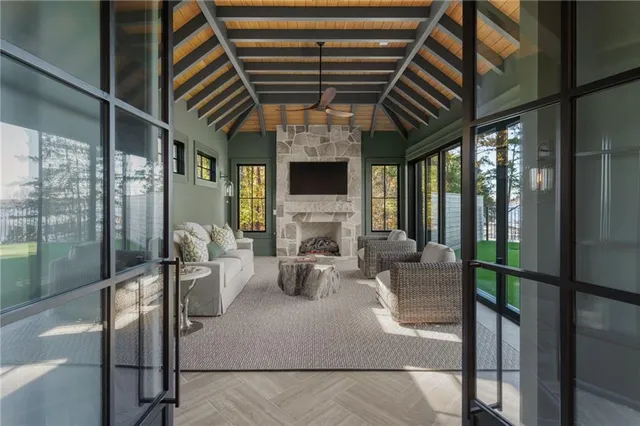 a view of a kitchen with wooden floor and a sink
