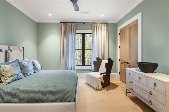 a view of swimming pool with outdoor seating and plants