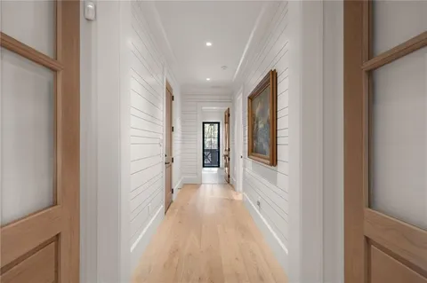 a outdoor space with patio couch and wooden floor