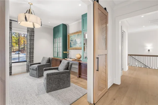 a view of a backyard with large trees