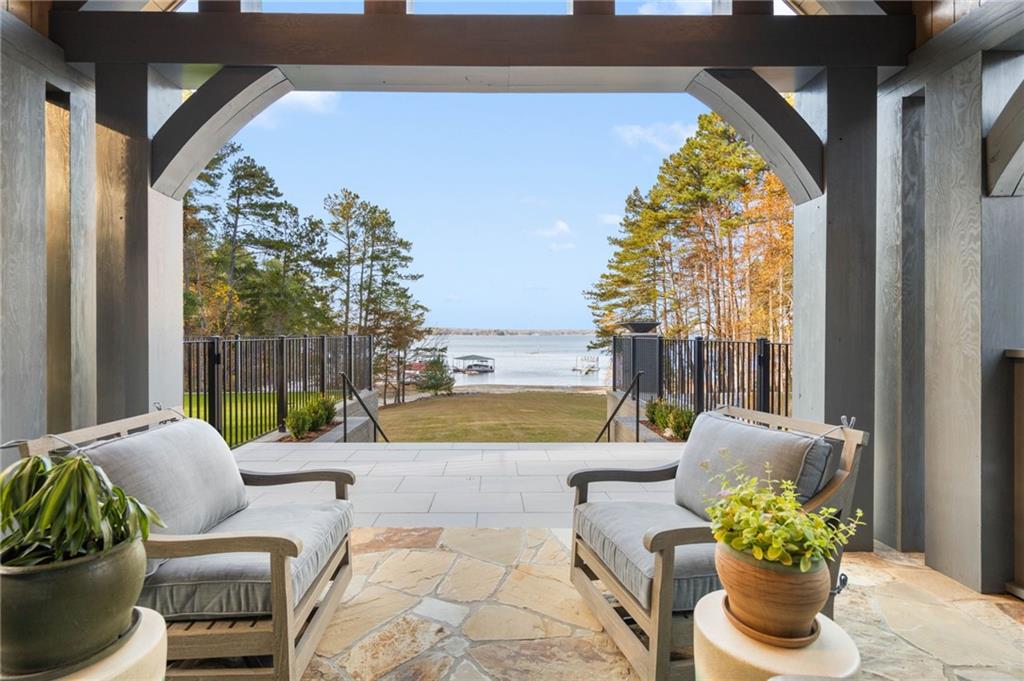 6091 GC Crow Road Flowery Branch, GA 30542 - Photo 93 of 100 a outdoor living space with furniture and a potted plant
