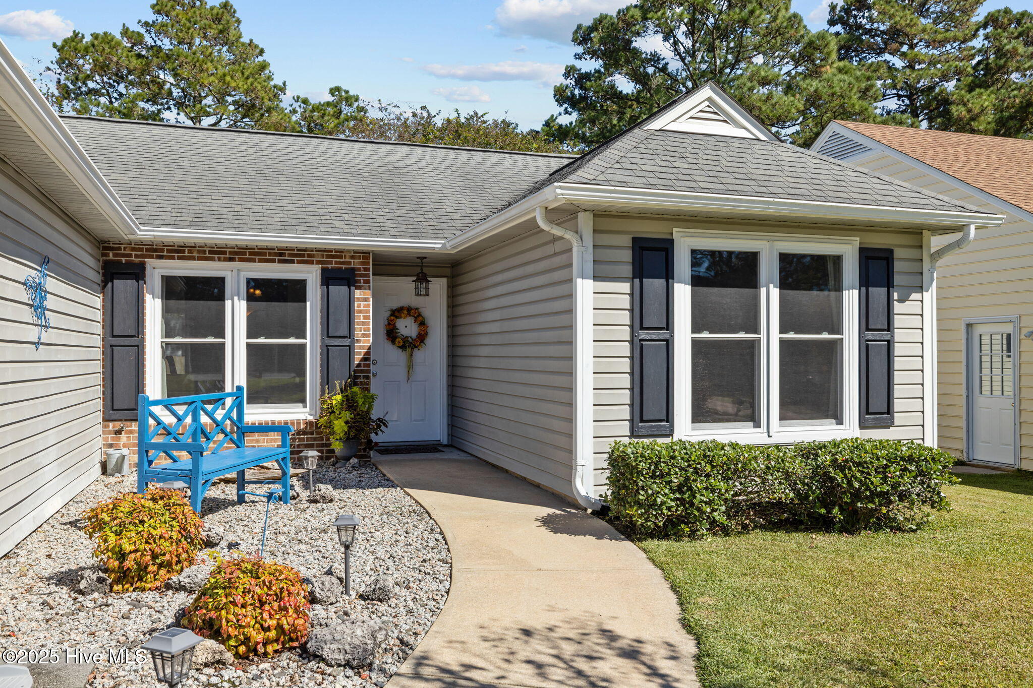 608 Barbour Road Morehead City, NC 28557 - Photo 29 of 41 Front of house with accent bench