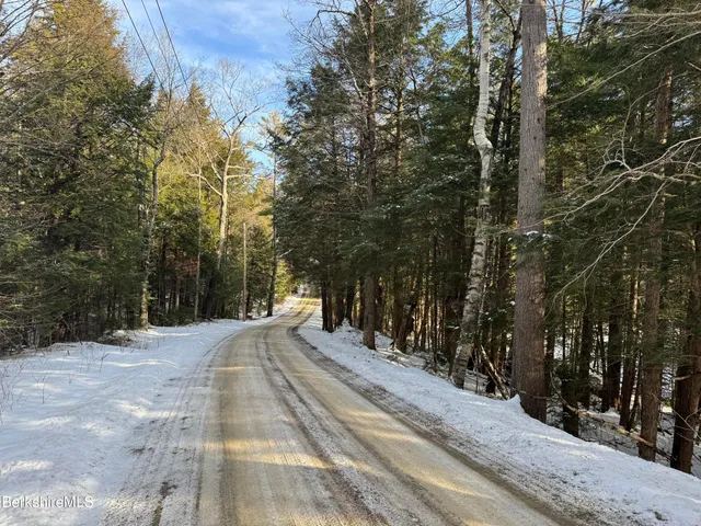 a view of a backyard of the house