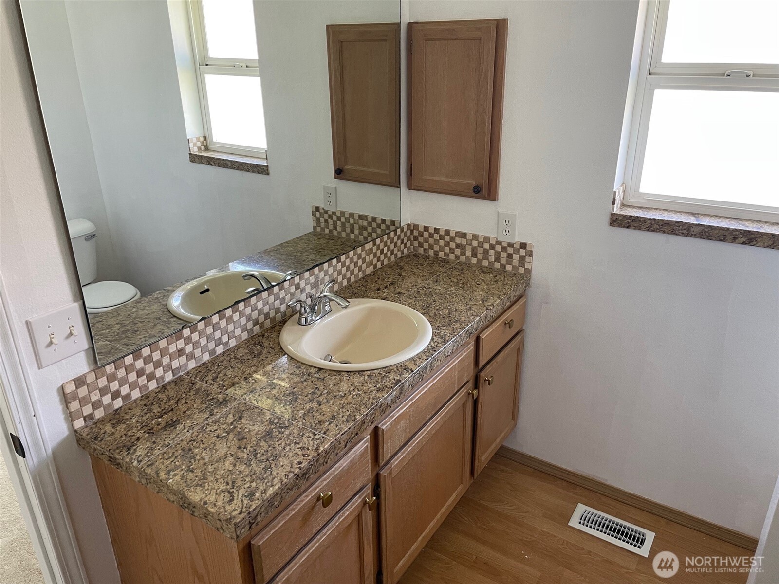 610 Rose Way Everett, WA 98203 - Photo 13 of 21 a bathroom with a granite countertop sink and a mirror