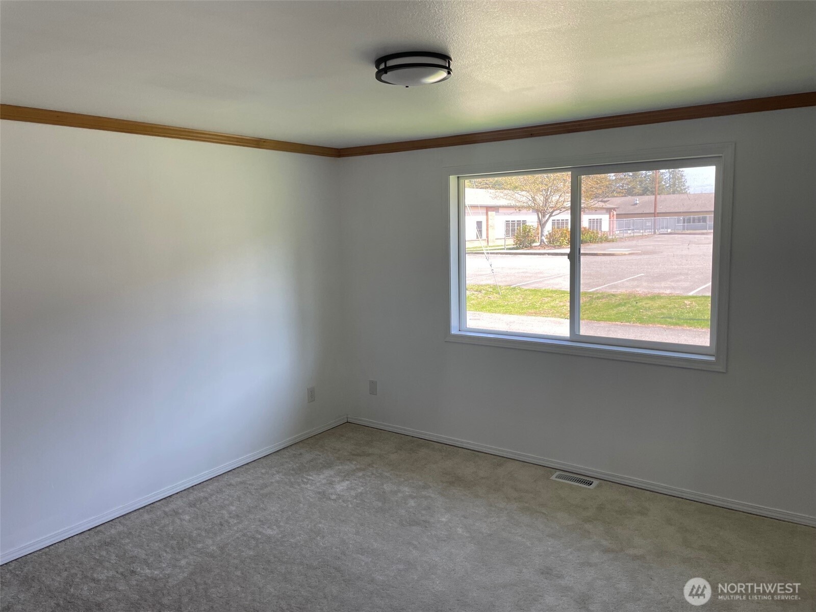 610 Rose Way Everett, WA 98203 - Photo 19 of 21 a view of an empty room with a window
