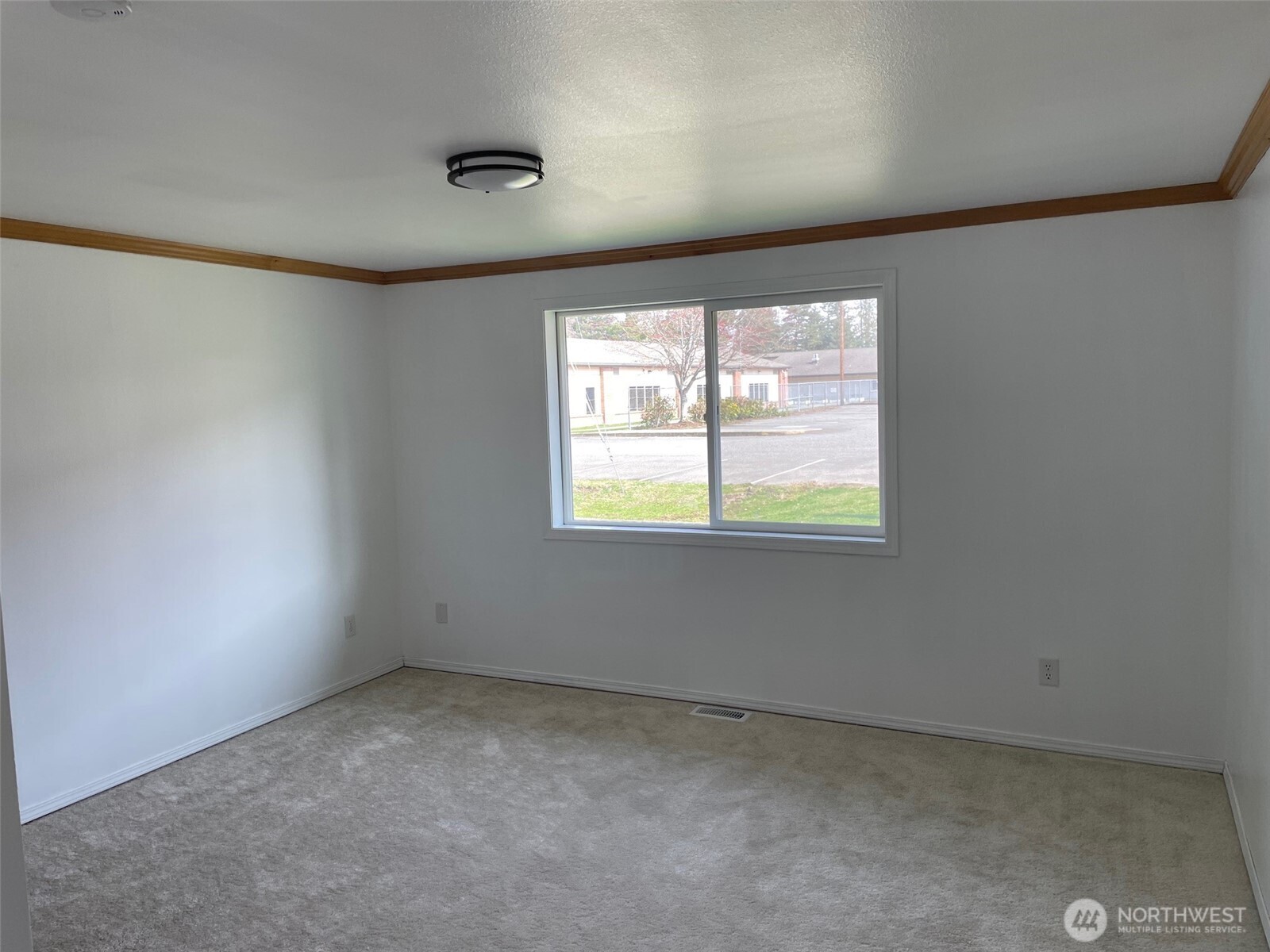 610 Rose Way Everett, WA 98203 - Photo 9 of 21 an empty room with windows