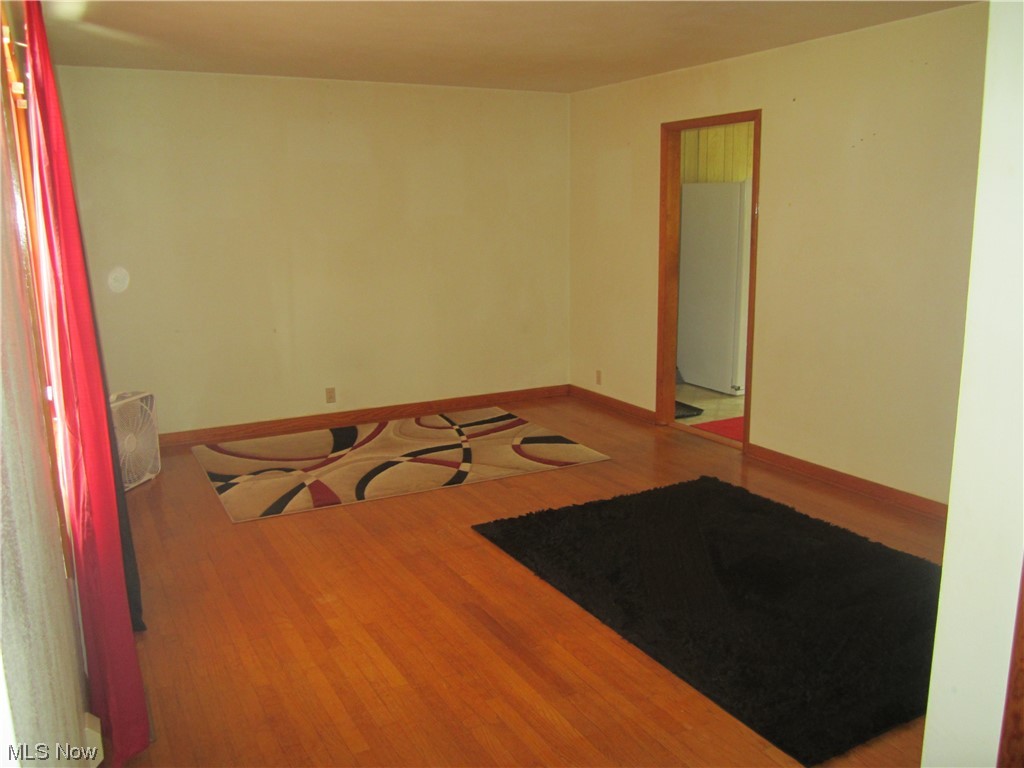 200 Summit Road Marietta, OH 45750 - Photo 15 of 35 Spare room featuring light hardwood floors