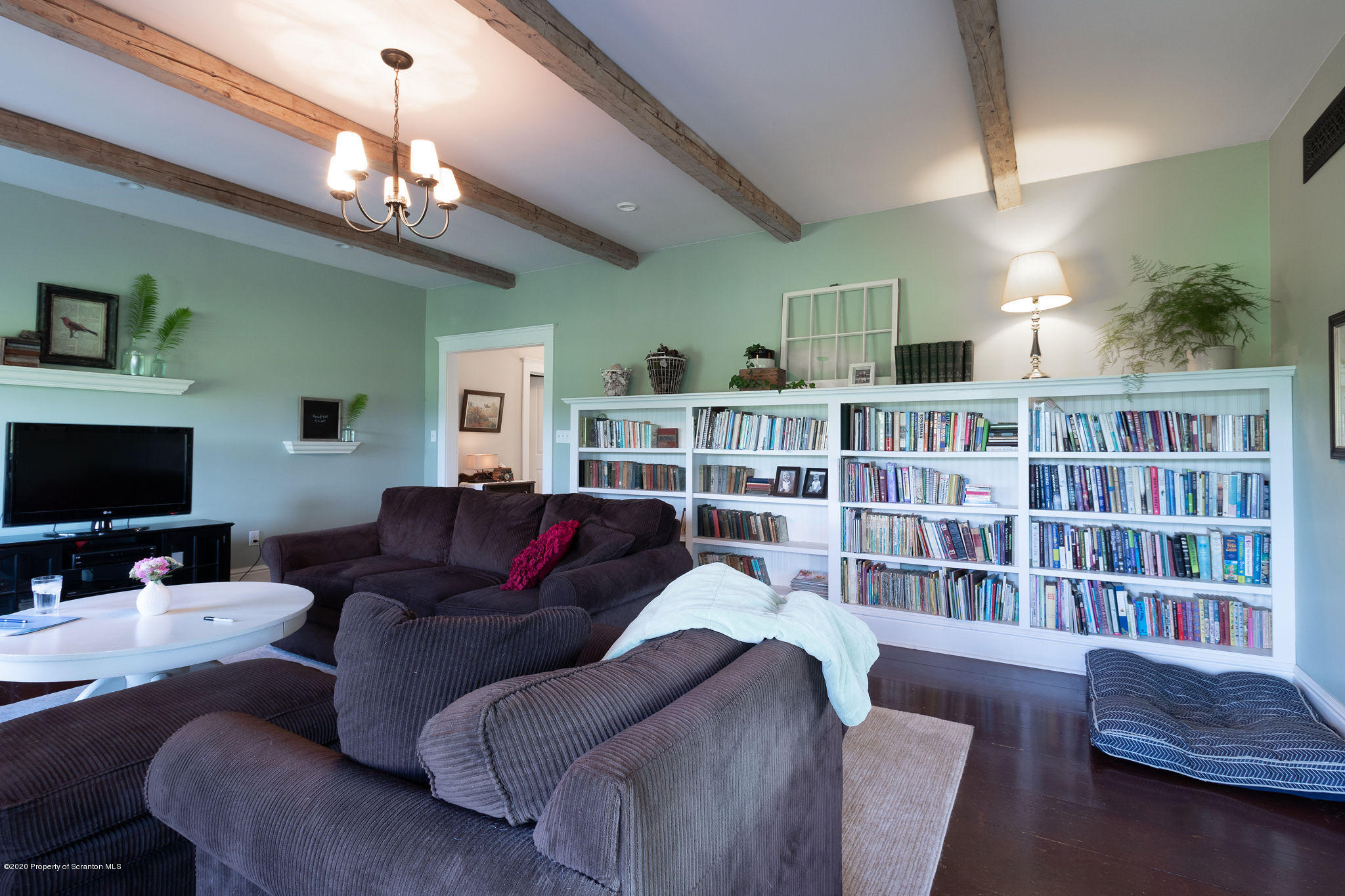 353 Freeman Road Dalton, PA 18414 - Photo 13 of 101 a living room with furniture and a flat screen tv