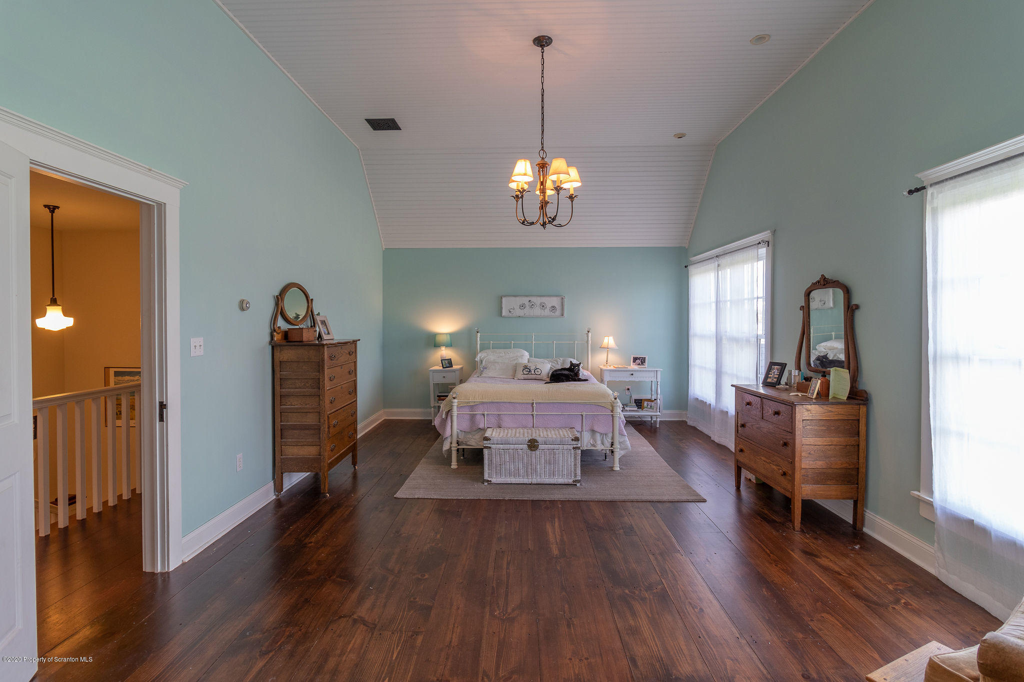 353 Freeman Road Dalton, PA 18414 - Photo 21 of 101 a view of a livingroom with furniture hardwood floor and a ceiling fan