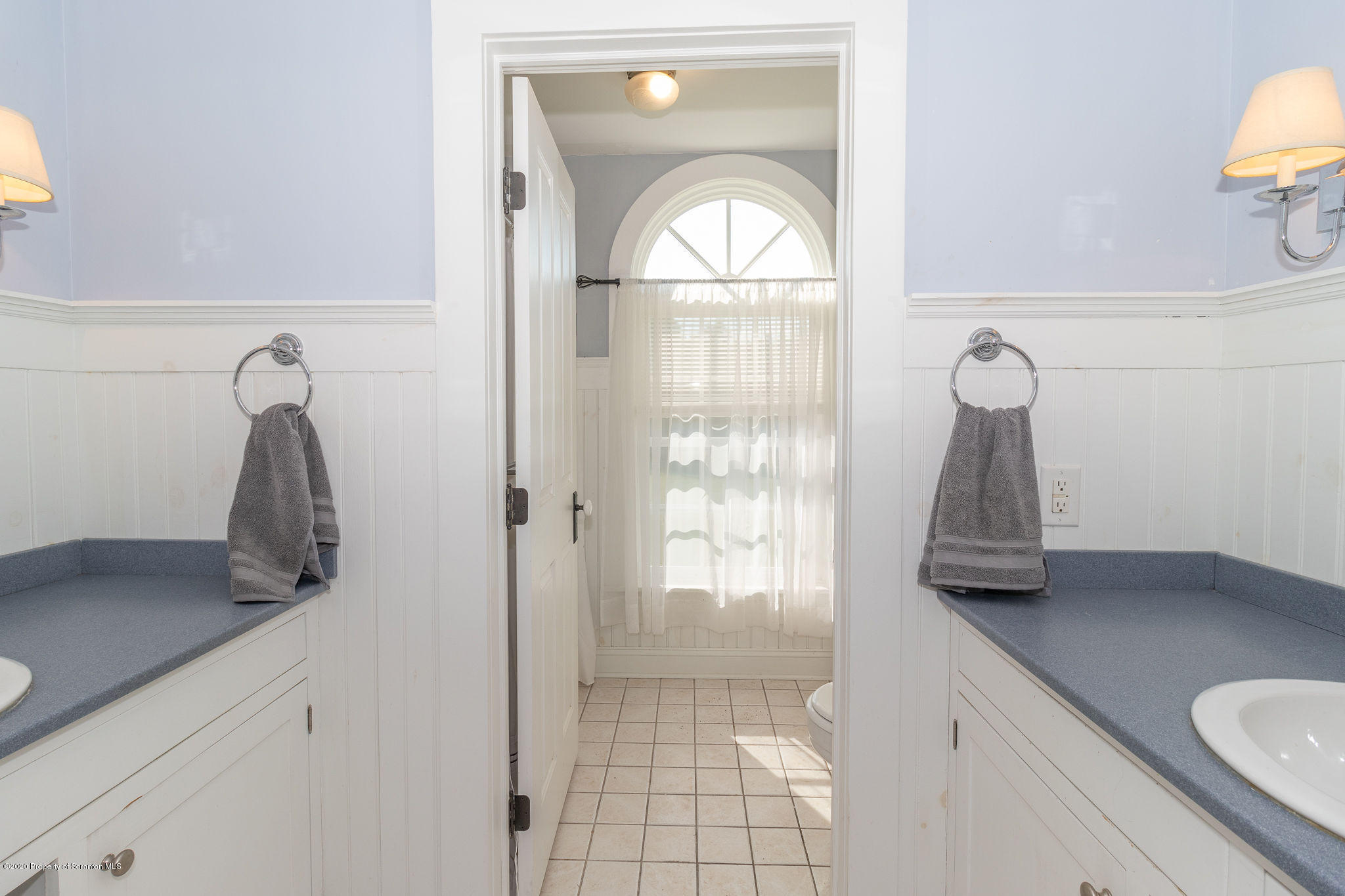 353 Freeman Road Dalton, PA 18414 - Photo 33 of 101 a bathroom with a sink a mirror and window