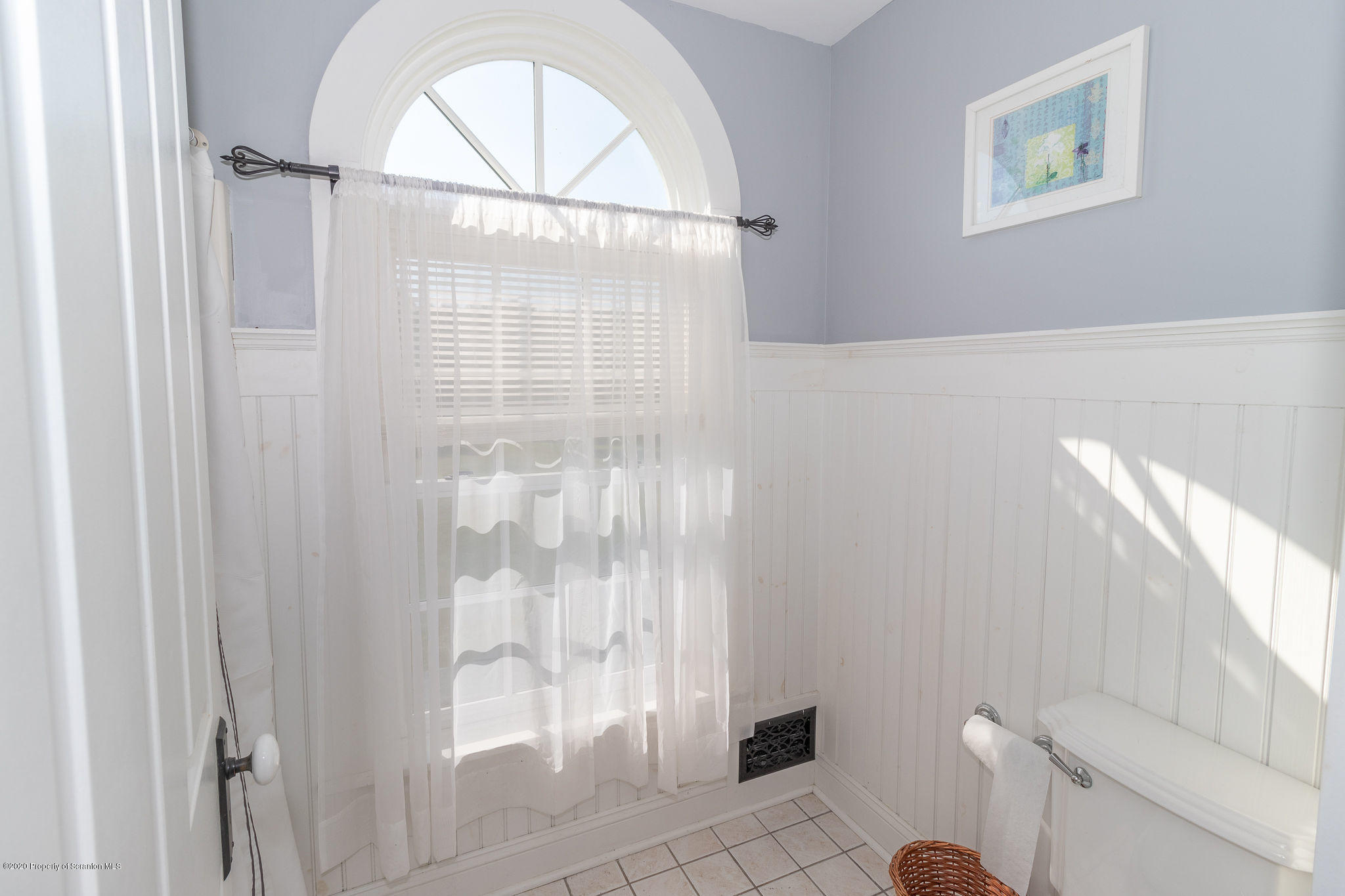 353 Freeman Road Dalton, PA 18414 - Photo 34 of 101 a bathroom with a glass shower door