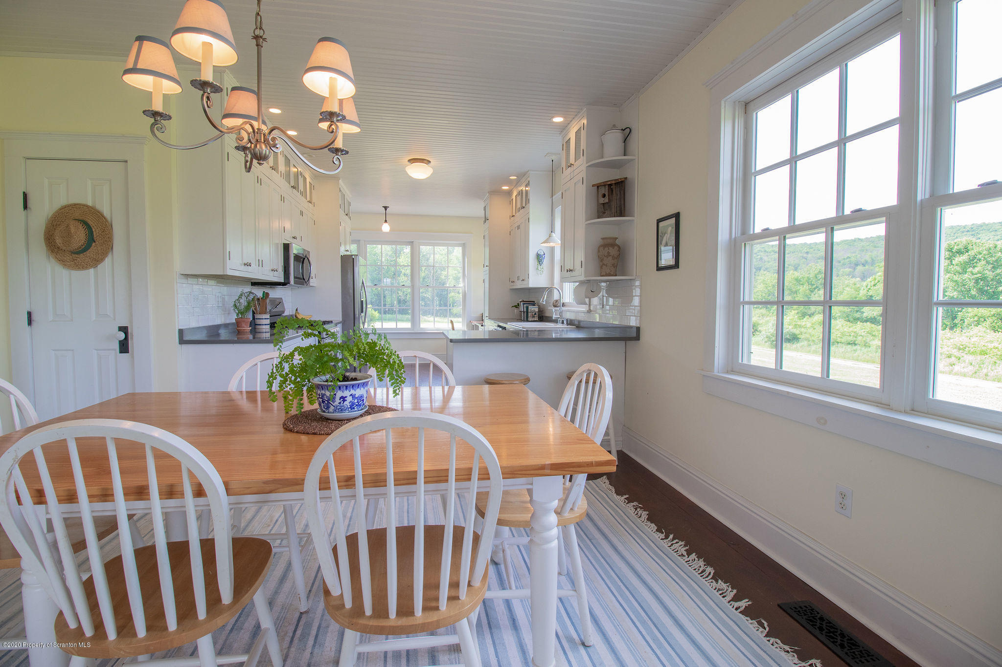 353 Freeman Road Dalton, PA 18414 - Photo 4 of 101 a view of a dining room with furniture window and wooden floor