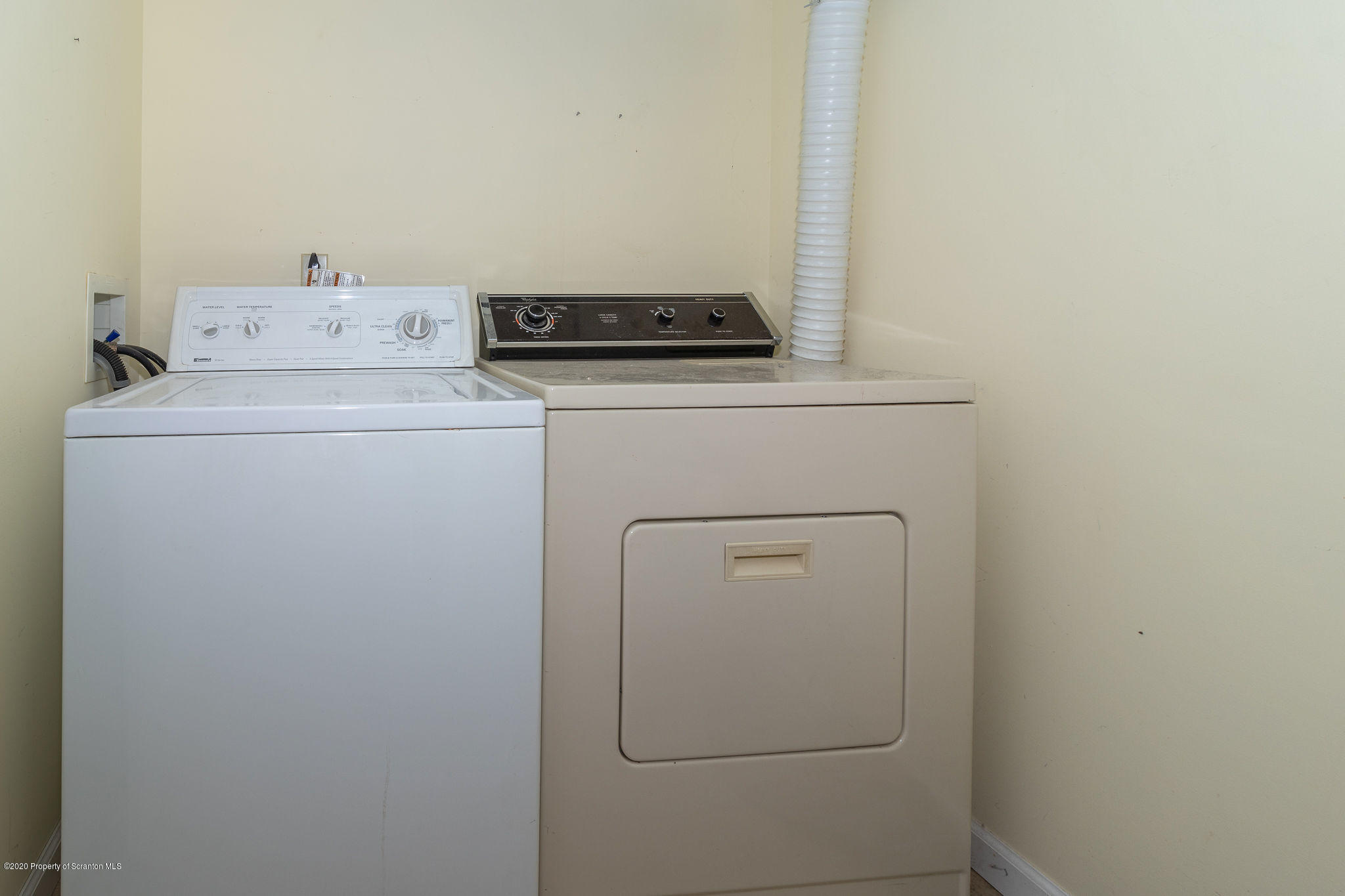 353 Freeman Road Dalton, PA 18414 - Photo 69 of 101 a utility room with dryer and washer