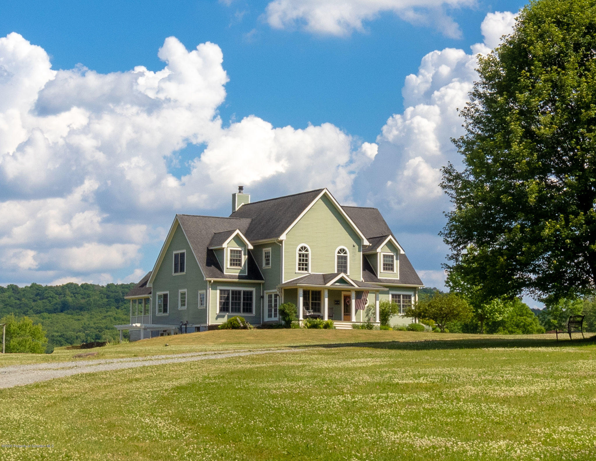 353 Freeman Road Dalton, PA 18414 - Photo 78 of 101 a front view of a house with a big yard