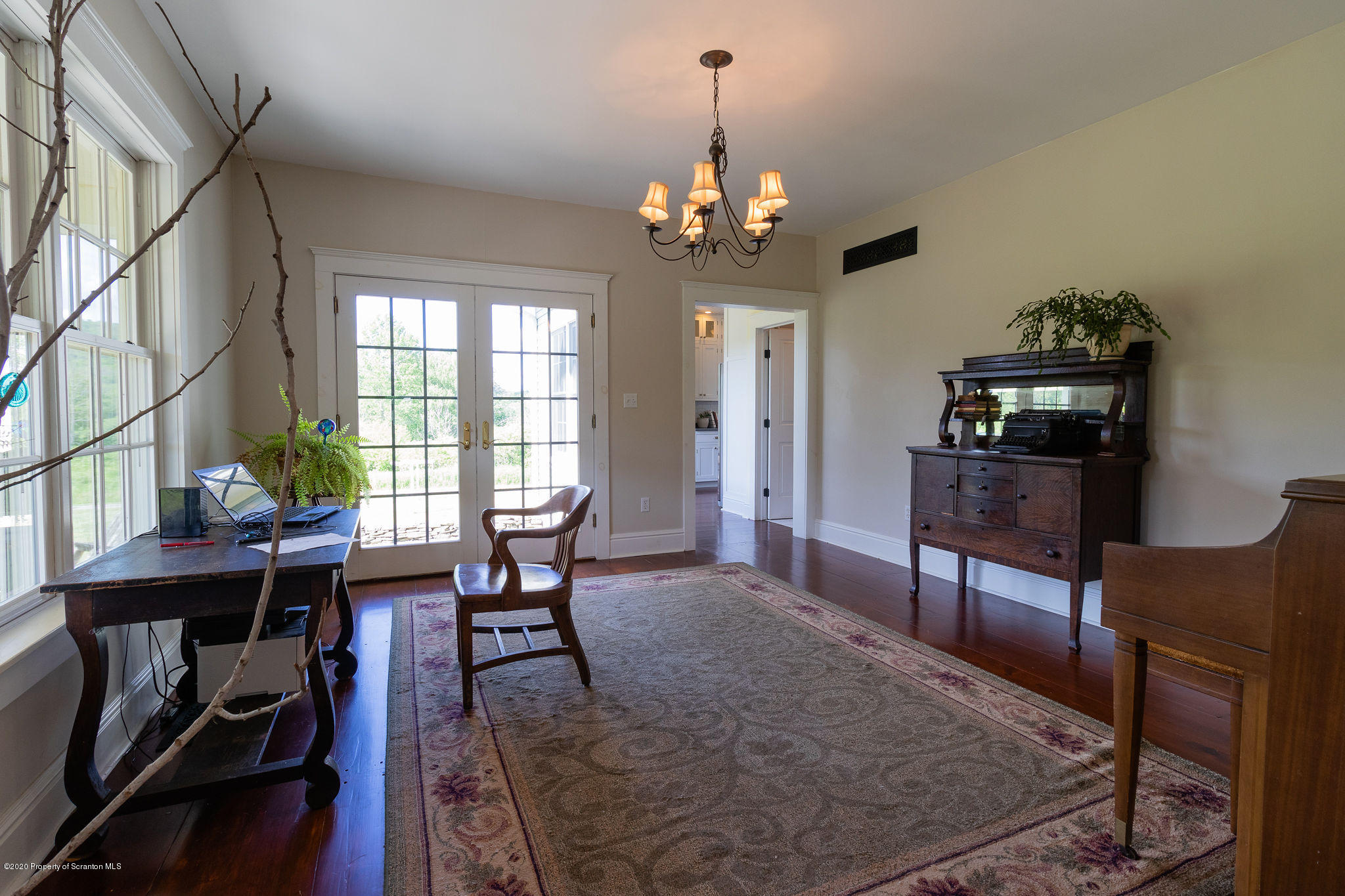 353 Freeman Road Dalton, PA 18414 - Photo 9 of 101 a view of a dining room with furniture window and wooden floor