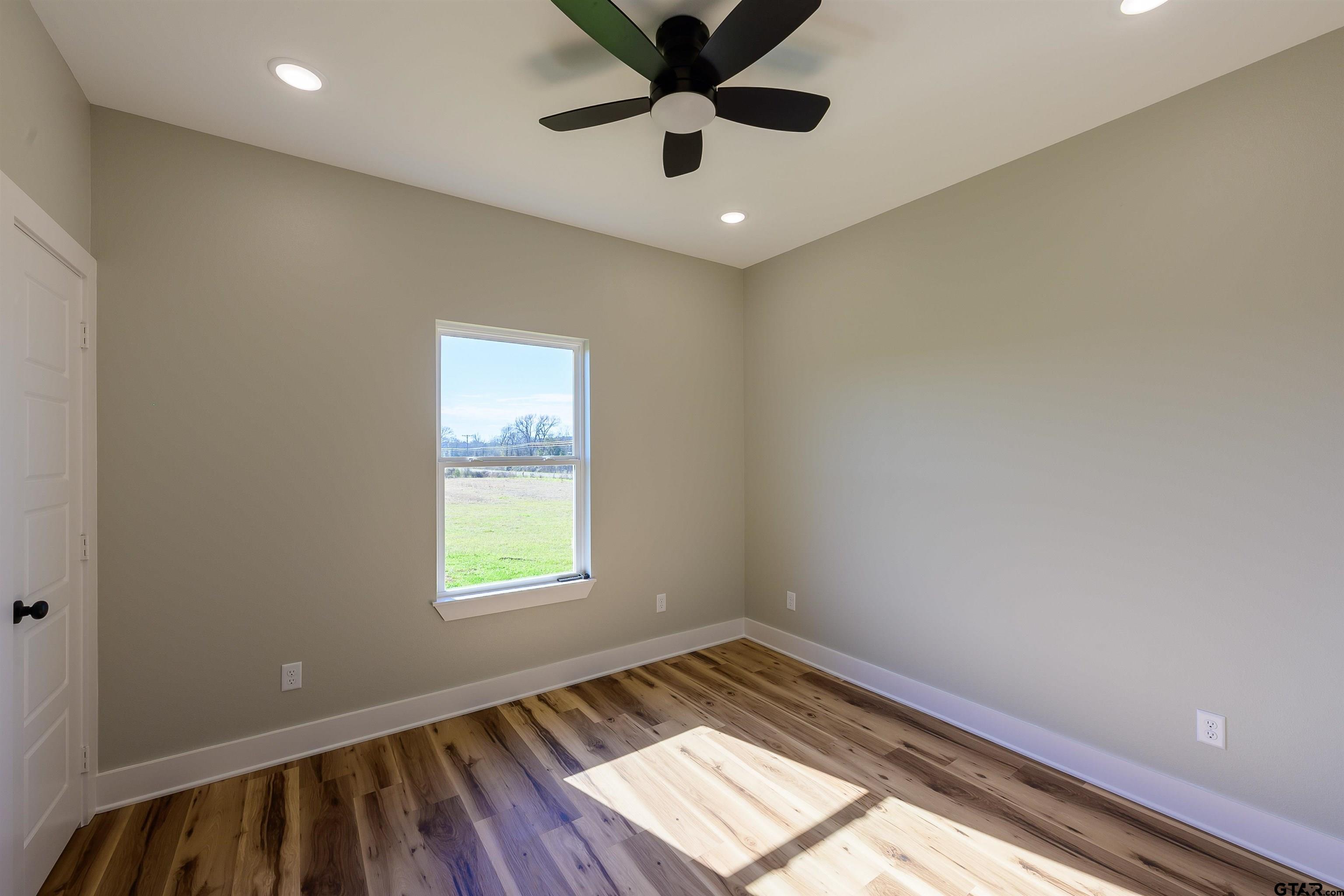 148 Crescent Bullard, TX 75757 - Photo 21 of 40 a view of an empty room and window