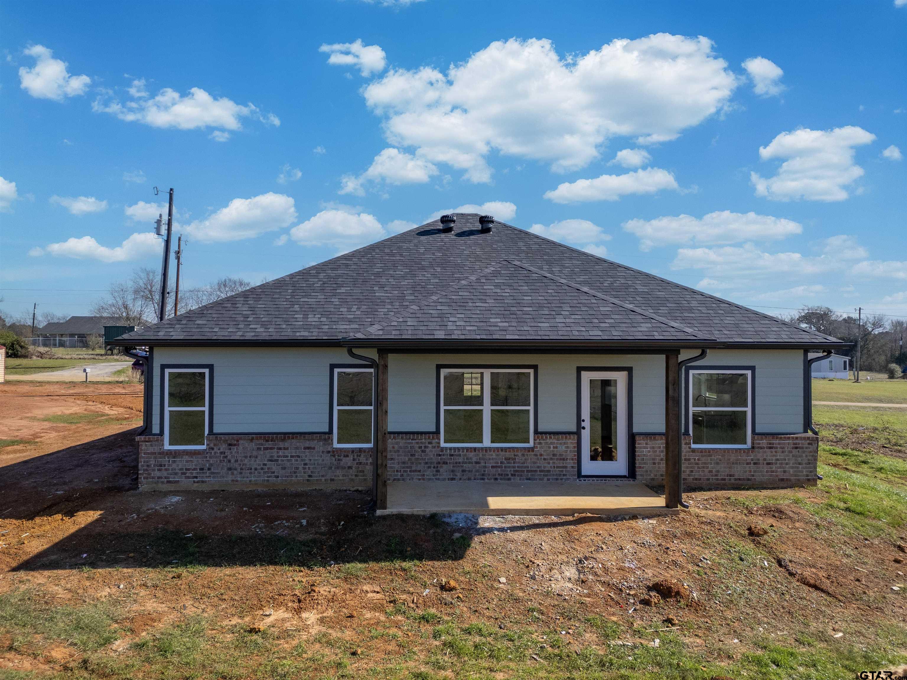 148 Crescent Bullard, TX 75757 - Photo 39 of 40 a front view of a house with a yard