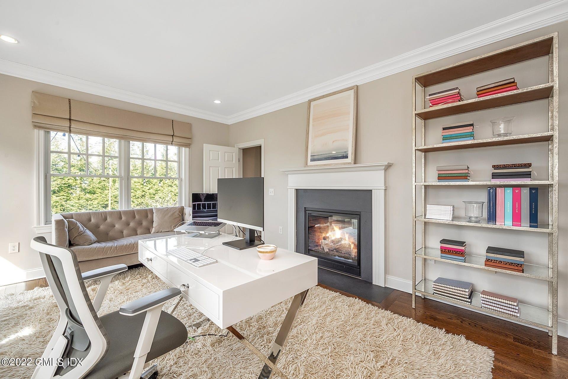 10 Boyd Lane Riverside, CT 06878 - Photo 13 of 30 a living room with furniture and a fireplace
