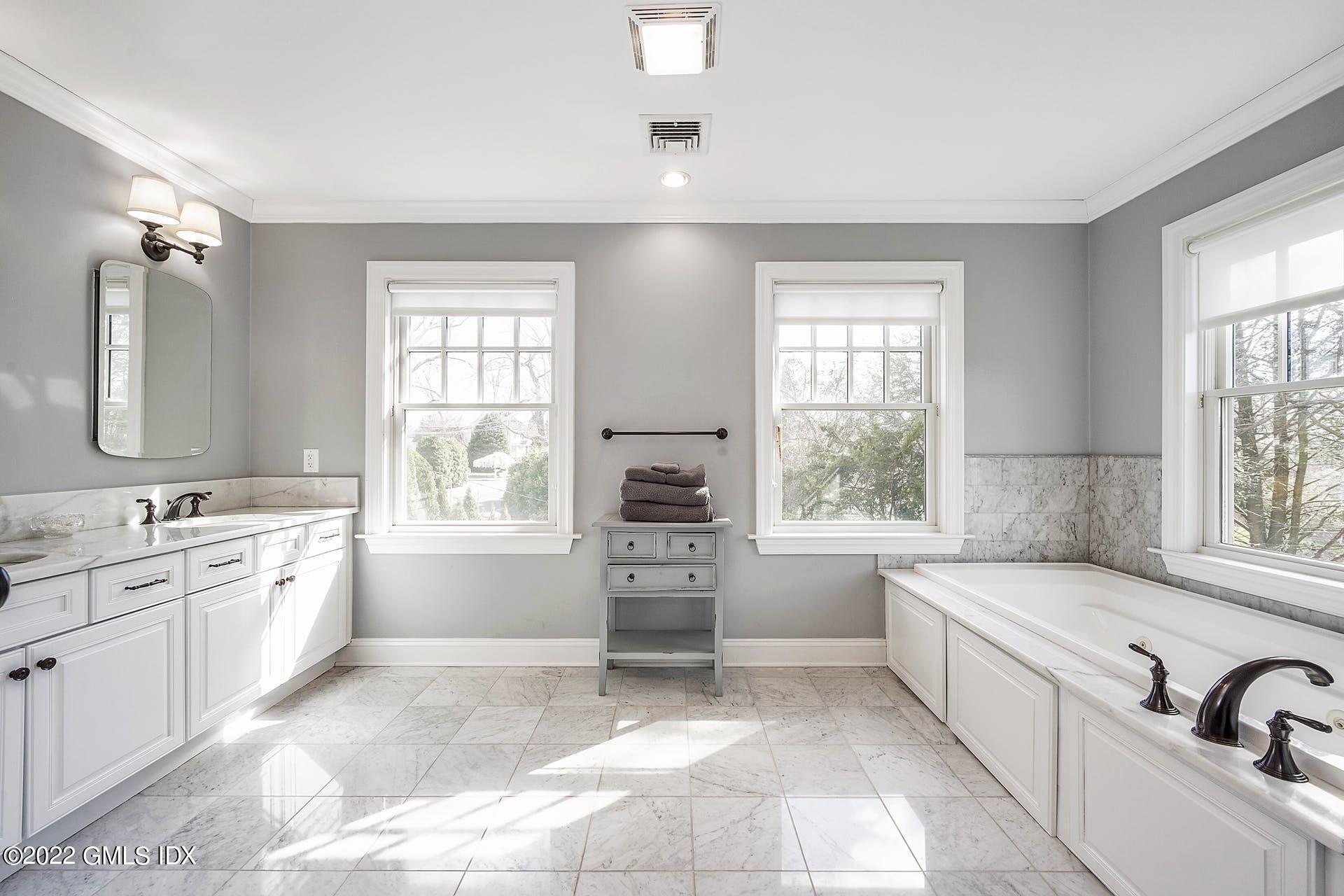 10 Boyd Lane Riverside, CT 06878 - Photo 16 of 30 a large white kitchen with a large window
