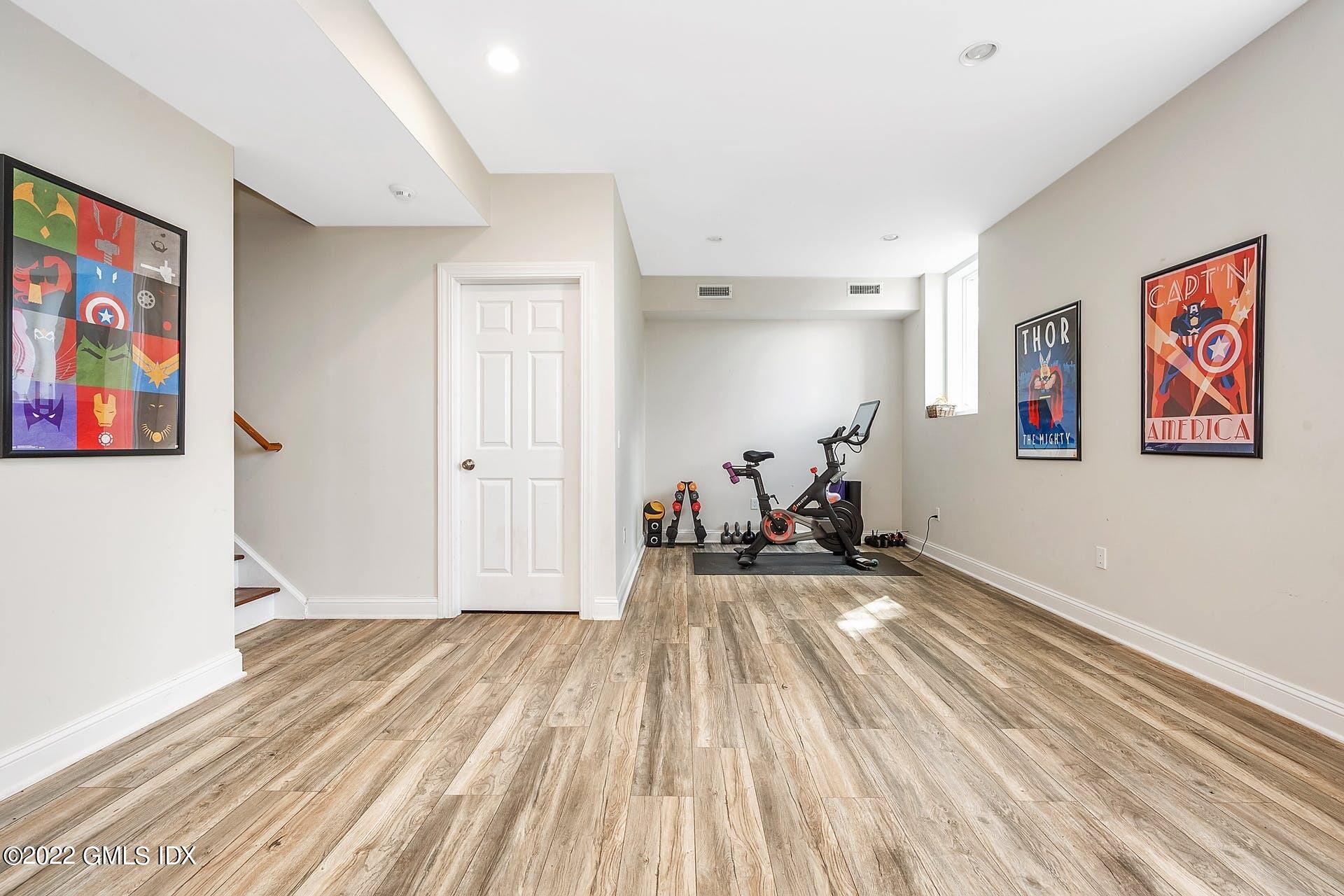 10 Boyd Lane Riverside, CT 06878 - Photo 24 of 30 a view of a livingroom with furniture and wooden floor