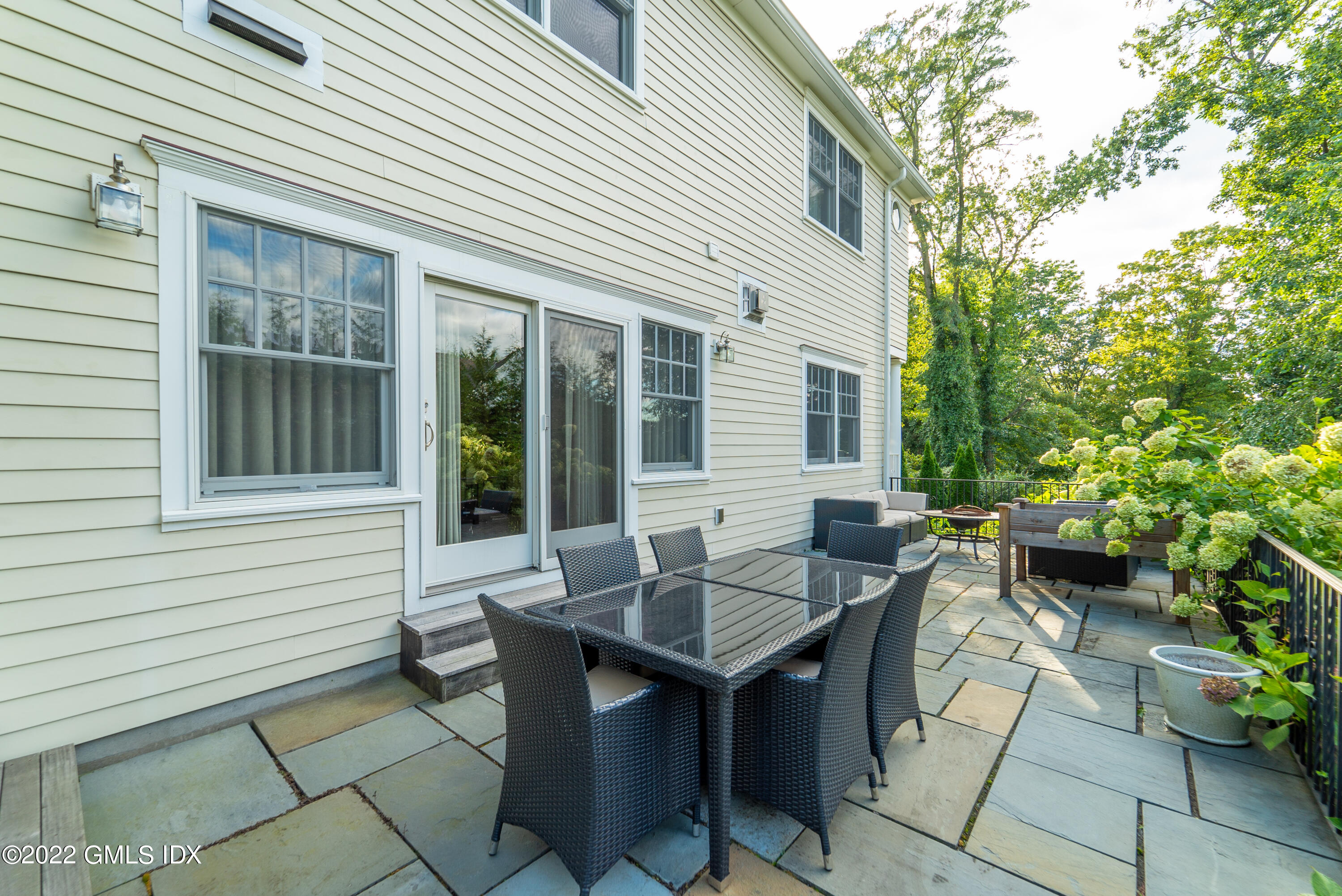 10 Boyd Lane Riverside, CT 06878 - Photo 26 of 30 a backyard of a house with outdoor seating