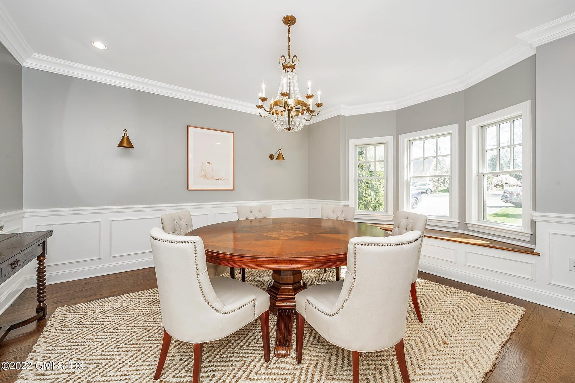 10 Boyd Lane Riverside, CT 06878 - Photo 4 of 30 a view of a dining room with furniture window and wooden floor