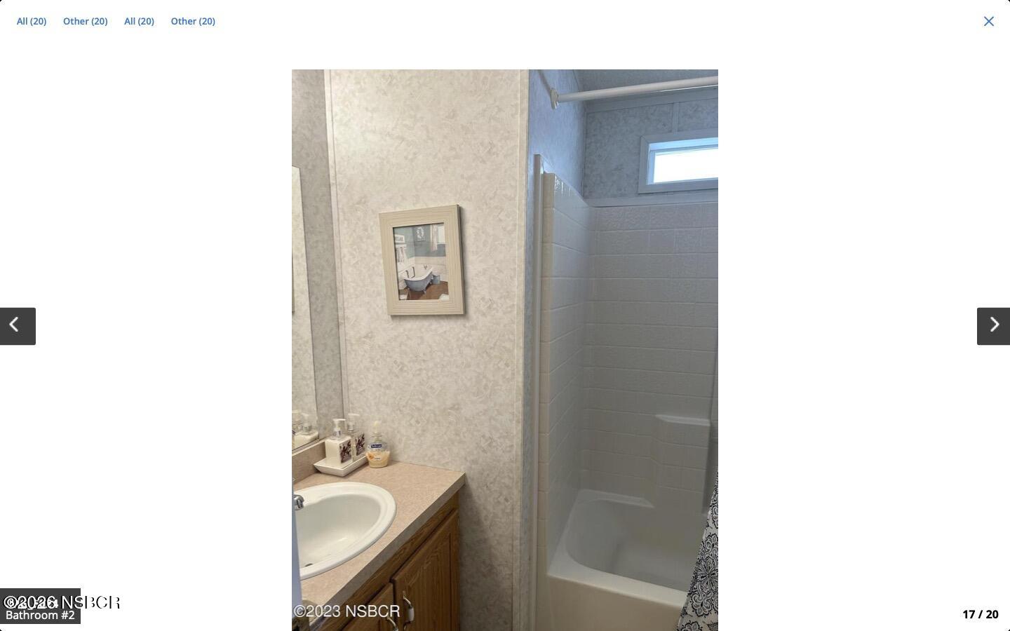 3210 Santa Maria Way, Unit 77 Santa Maria, CA 93455 - Photo 13 of 16 a bathroom with a sink and a mirror