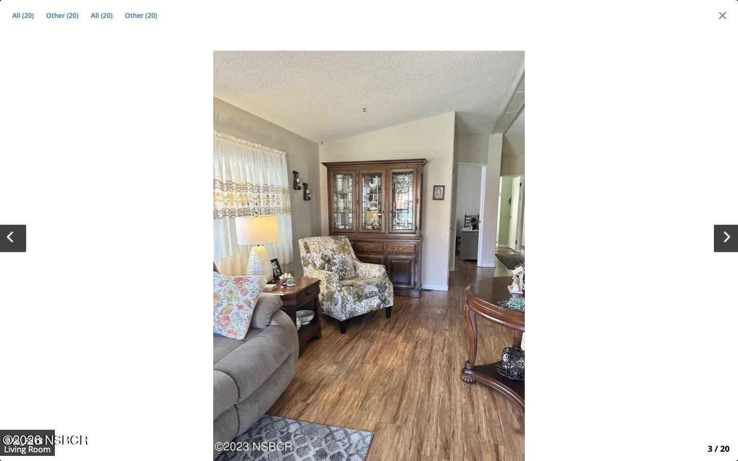 3210 Santa Maria Way, Unit 77 Santa Maria, CA 93455 - Photo 2 of 16 a living room with furniture and a wooden floor