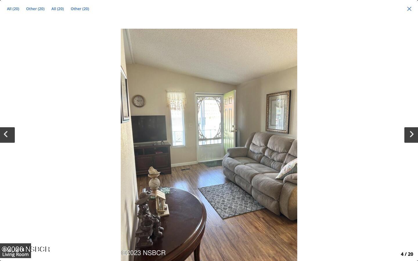 3210 Santa Maria Way, Unit 77 Santa Maria, CA 93455 - Photo 3 of 16 a living room with furniture and a window