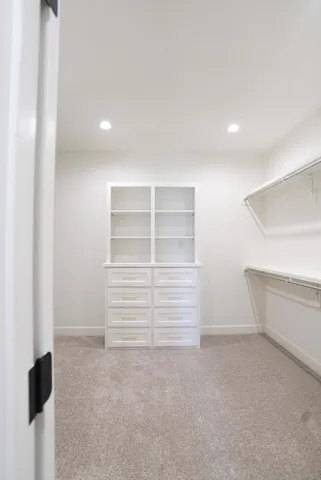 a white bath tub sitting in a bathroom