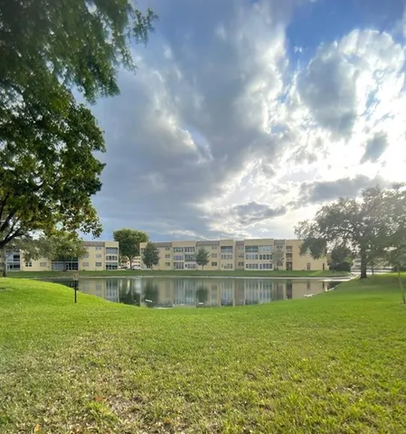 a view of a lake in front of the house