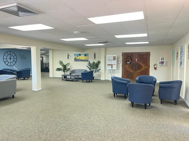 a living room with furniture and a couch