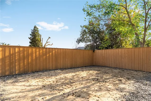 an aerial view of residential building and parking space