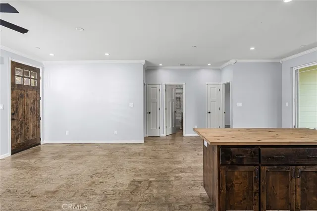 a view of room with sink and hallway
