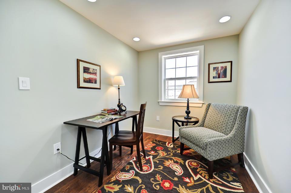 1110 Orren Street Northeast Washington, DC 20002 - Photo 18 of 30 a living room with furniture and a window