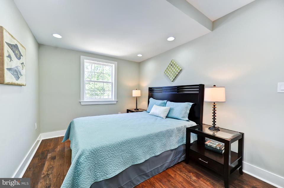 1110 Orren Street Northeast Washington, DC 20002 - Photo 20 of 30 a bedroom with a bed and window