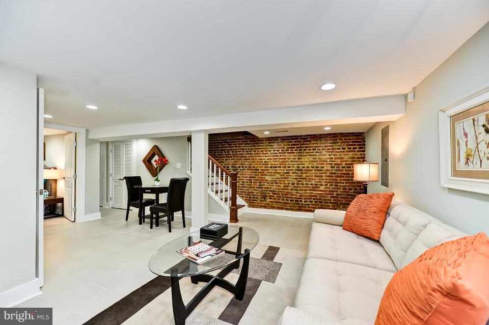 1110 Orren Street Northeast Washington, DC 20002 - Photo 22 of 30 a living room with furniture and a large window