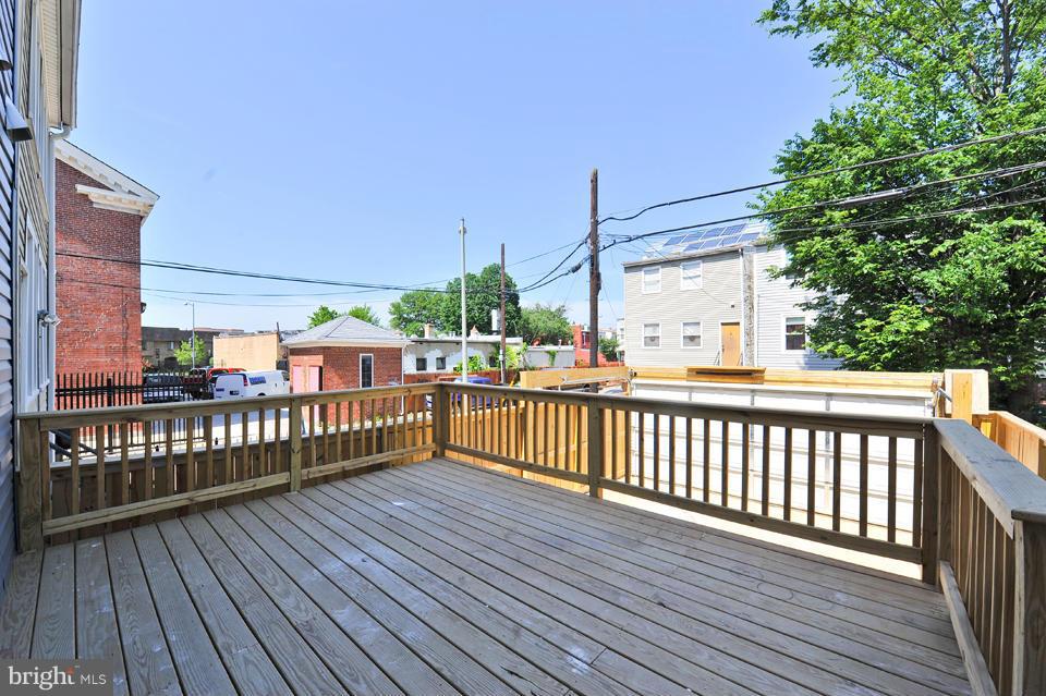1110 Orren Street Northeast Washington, DC 20002 - Photo 28 of 30 a view of balcony with wooden floor