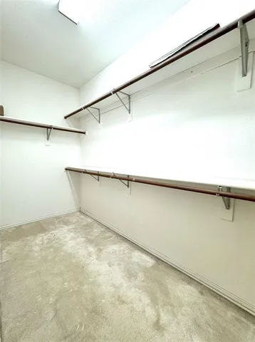 a view of a refrigerator in a room