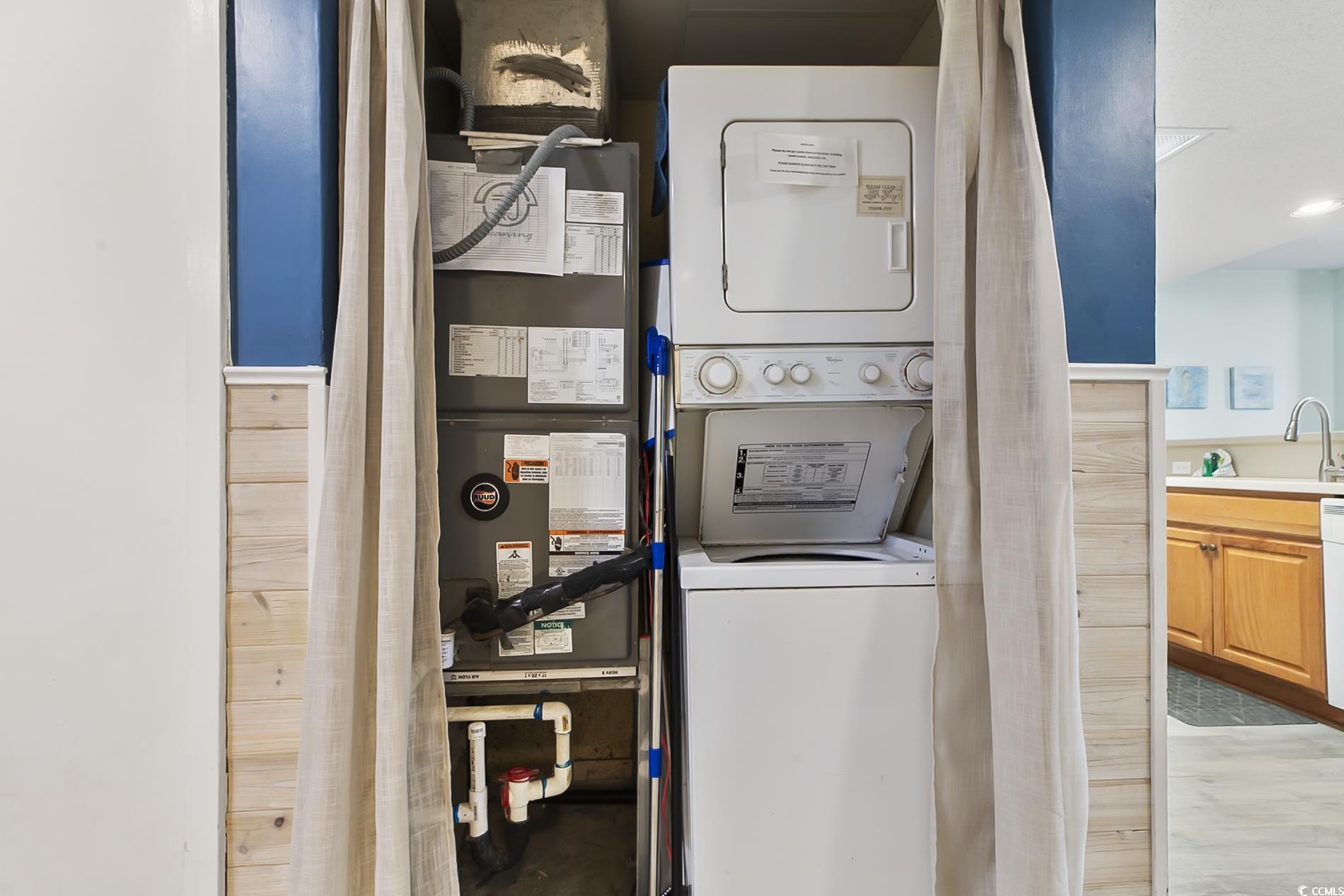 205 74th Avenue North, Unit 708 Myrtle Beach, SC 29572 - Photo 25 of 38 Washroom with heating unit and stacked washer / drying machine