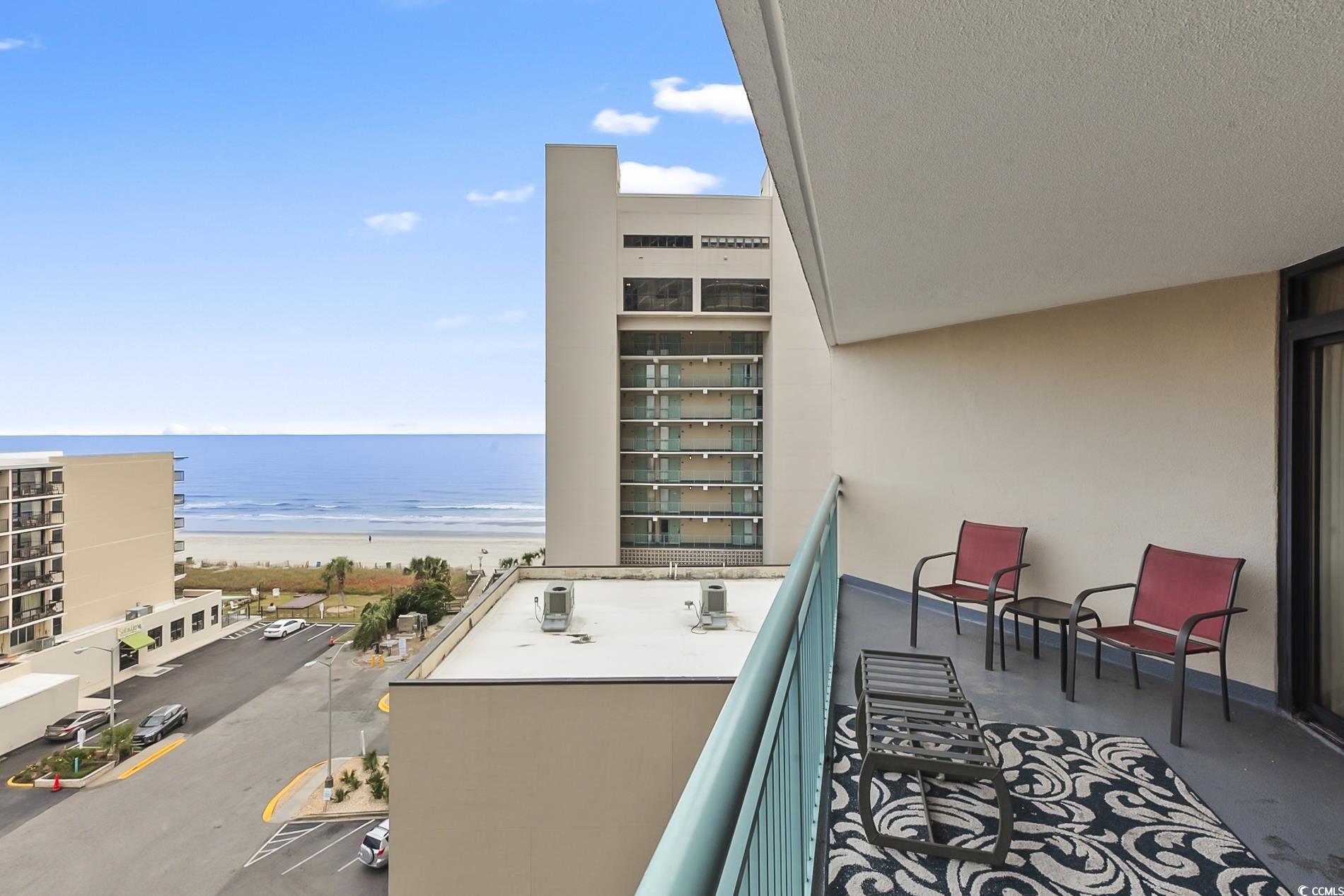 205 74th Avenue North, Unit 708 Myrtle Beach, SC 29572 - Photo 27 of 38 Balcony featuring view of water and beach